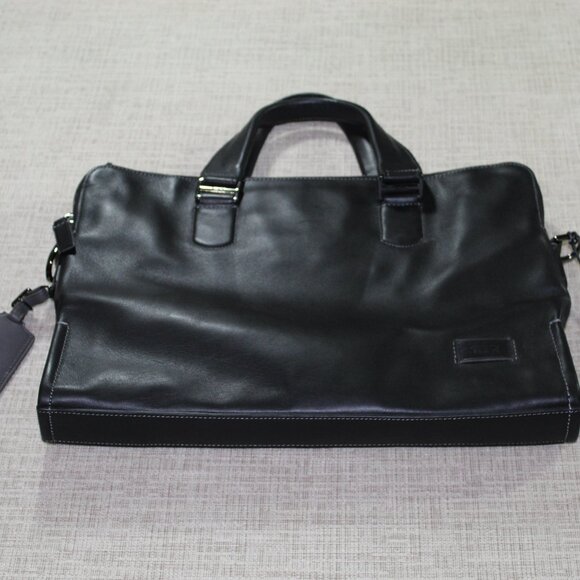 NWT Tumi Seneca Slim Brief Laptop Bag Carry On Black Leather - Picture 1 of 11